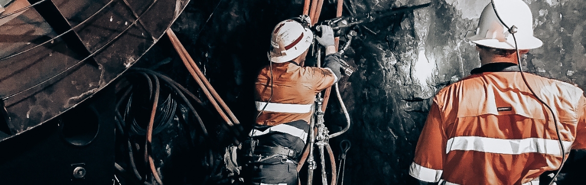 Minetek air team installing HO Axial fan in underground mine